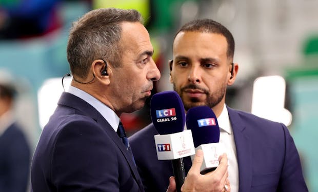 TF1 commentators Youri Djorkaeff, Saber Desfarges at the 2022 FIFA World Cup. (Photo by Jean Catuffe/Getty Images)